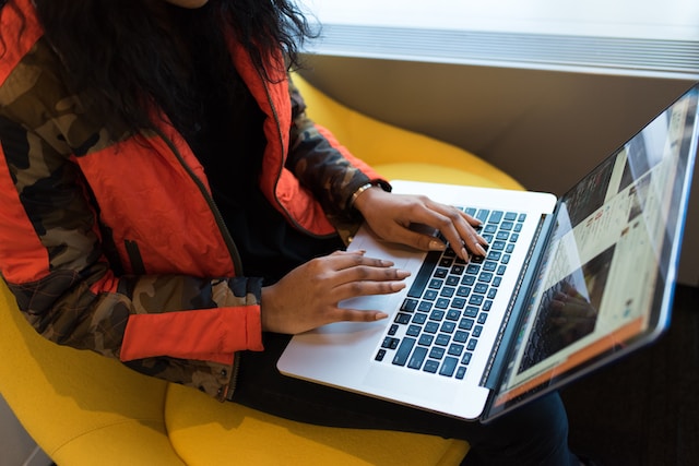 Person Convert Presentations to Google Slides on his laptop