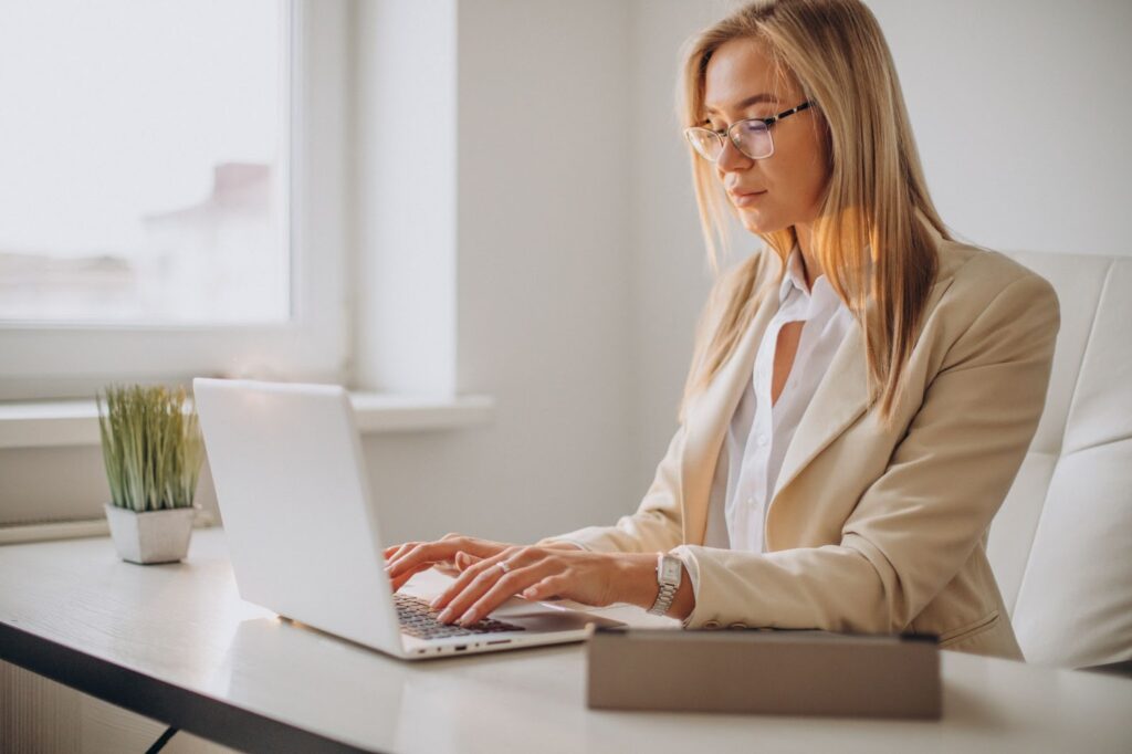 Woman working on computer in office